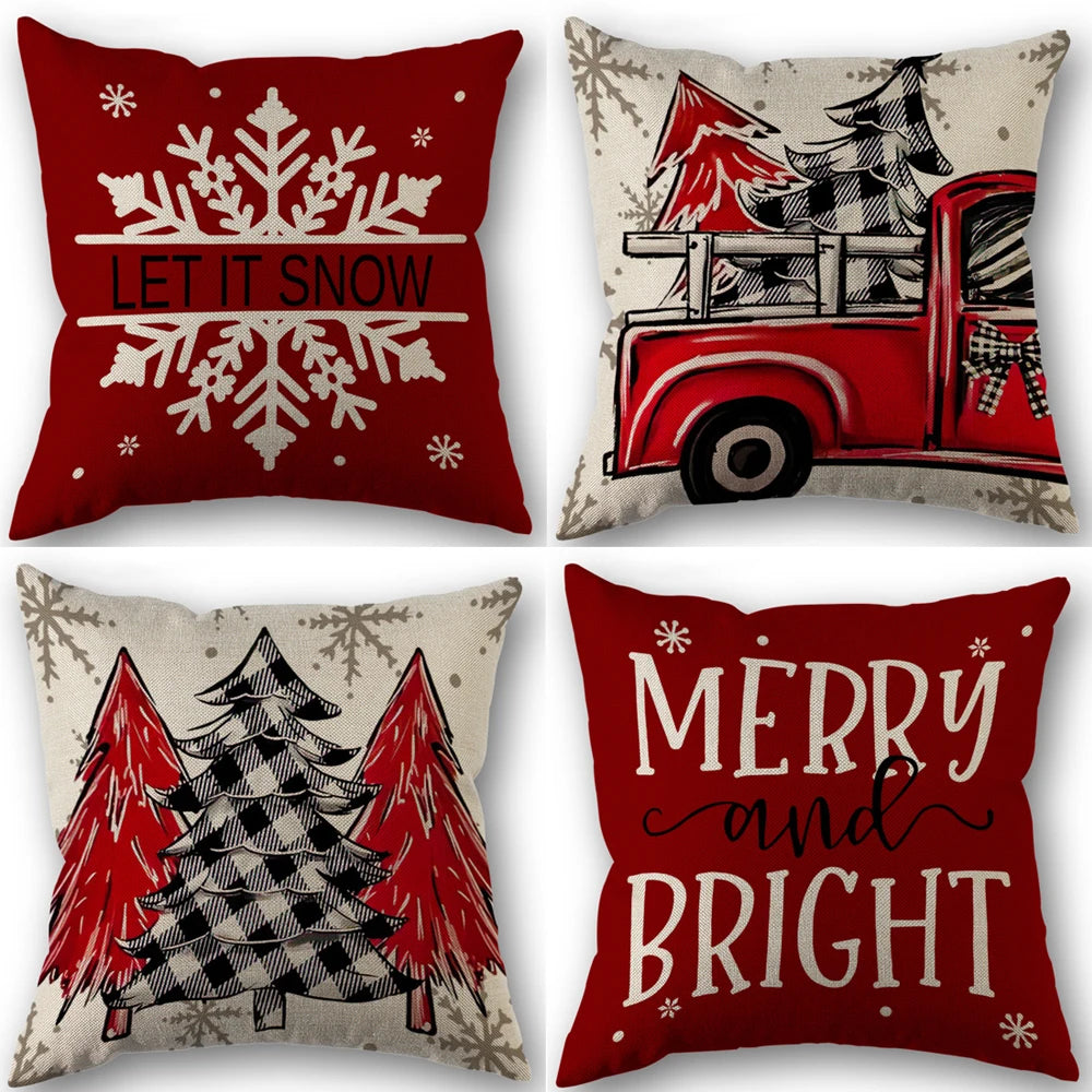 Four festive pillow covers featuring winter and holiday designs in red, white, and gray tones.
