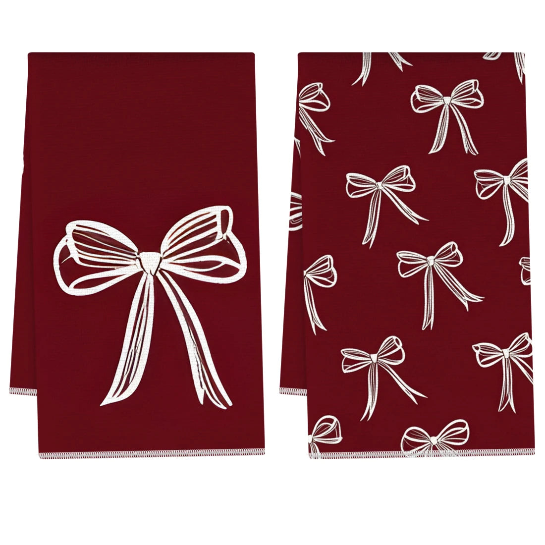 A set of two deep red kitchen towels featuring white bow patterns.