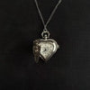 Silver heart-shaped pocket watch keychain with a chain and adjustable clock face
