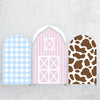 Three vertical fabric panels in blue gingham, pink stripes, and brown leopard print for an elegant party arch backdrop.