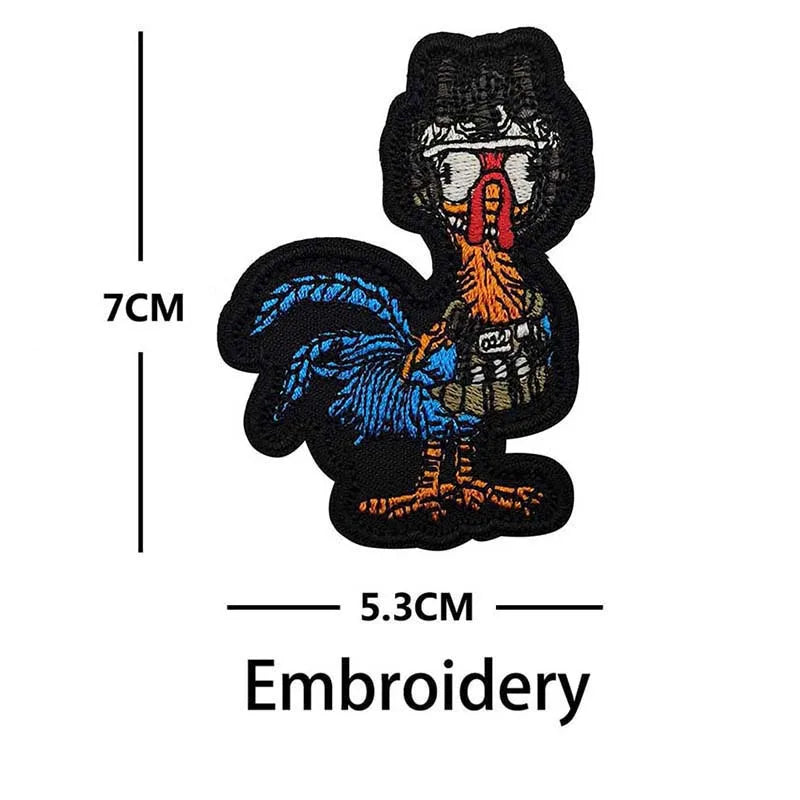Black embroidery patch of a fierce bird with red beak and blue feathers
