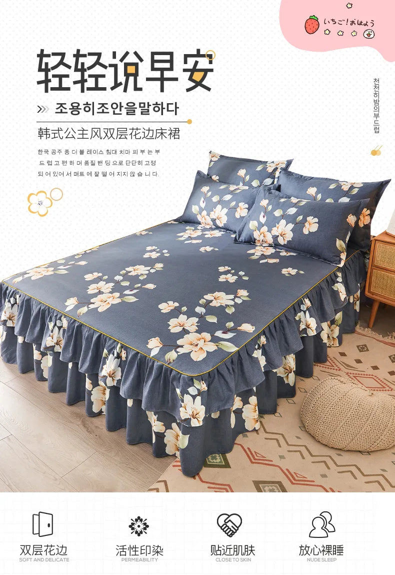 A dark blue bed featuring a ruffled skirt with white floral print, showcasing the double layer printed bed skirt.
