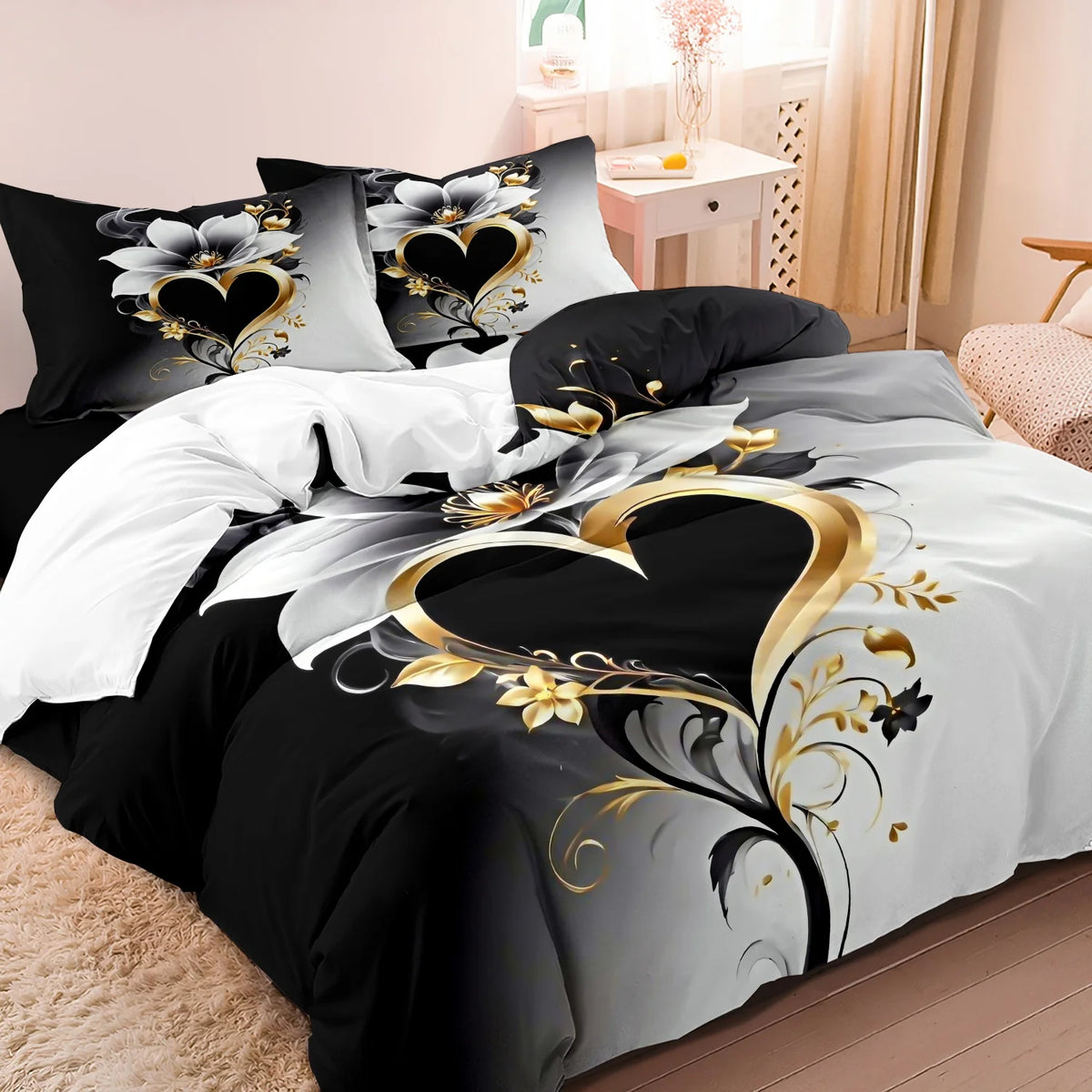 Black and white duvet cover featuring a romantic floral design with gold scroll accents.
