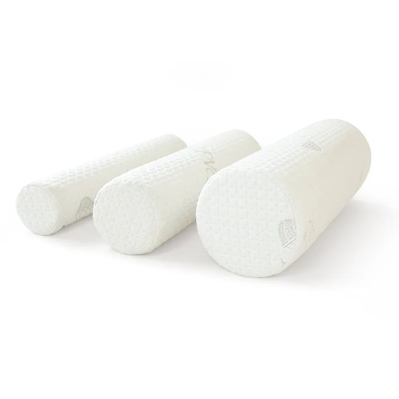 A white memory foam neck roll pillow shown from the side.