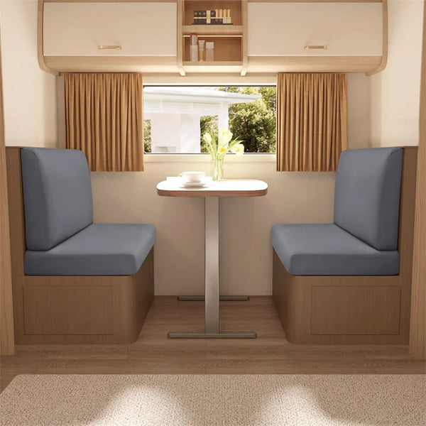 Two upholstered dinette seats with light blue cushions and wooden frames are shown in a modern interior setting.