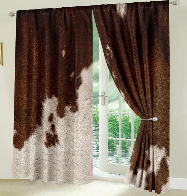 Brown and white cow print curtains hanging in a doorway