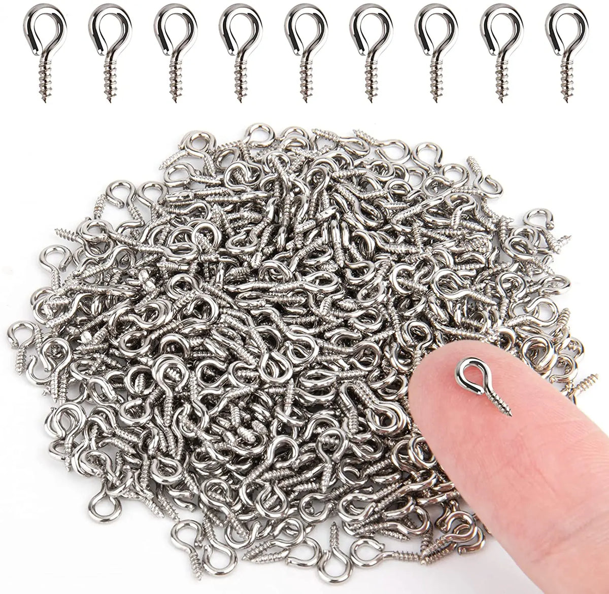 A pile of silver stainless steel eye screw pins for jewelry making, showing various sizes and styles.