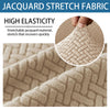 Close-up of a beige jacquard stretch fabric showing its woven pattern and elasticity.
