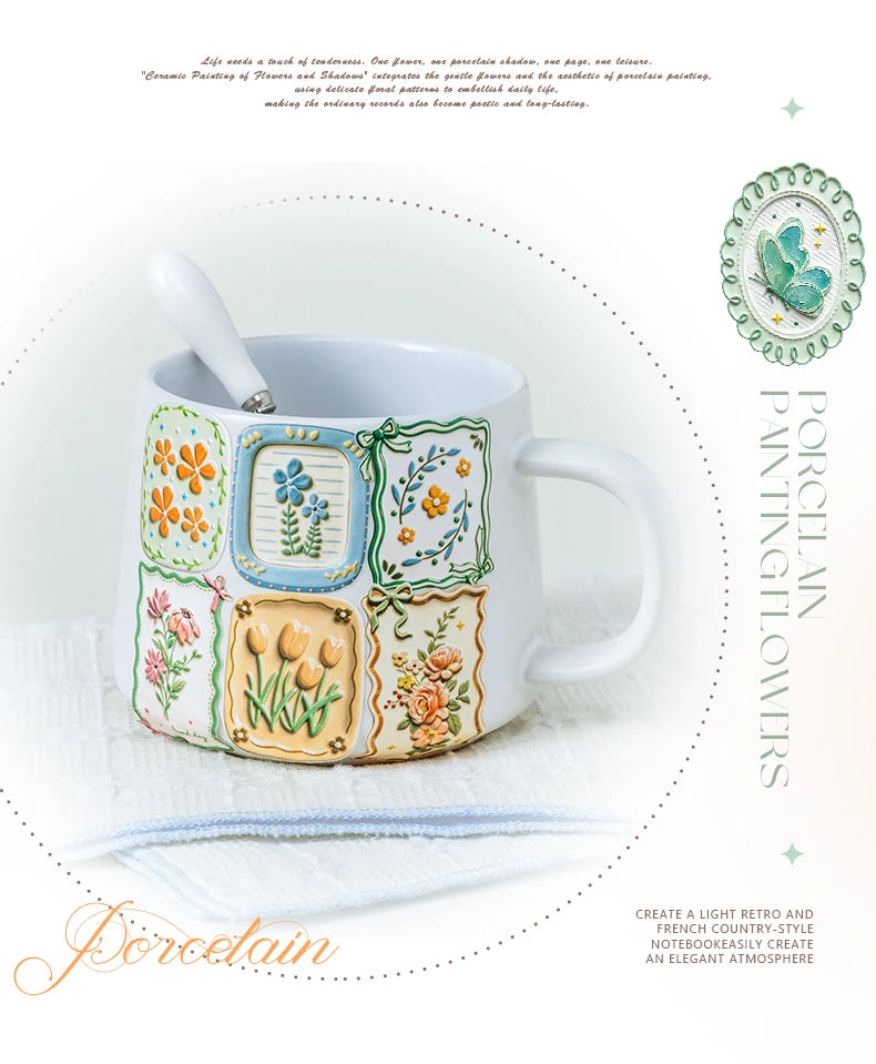 A white porcelain mug decorated with colorful botanical flowers and leaves, set against a light background.
