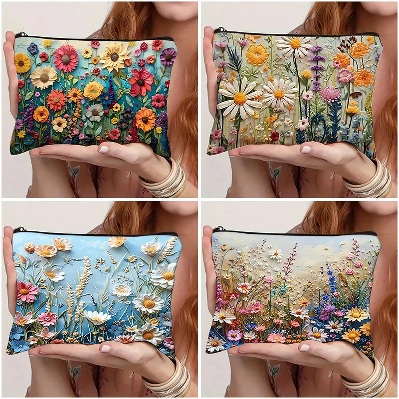 A floral canvas cosmetic bag with a zipper closure featuring colorful flowers and greenery.