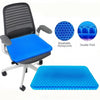 A gray office chair with a blue honeycomb silicone seat cushion and an additional blue double thick cushion shown alongside c