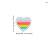 A heart-shaped embroidered patch featuring a rainbow stripe pattern in pink, orange, yellow, green, and blue.