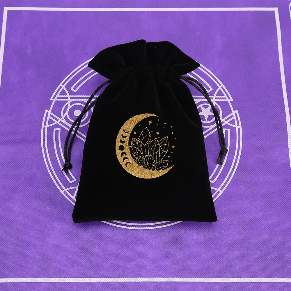 Black velvet tarot cards storage pouch with a gold crescent moon and floral design on a purple background