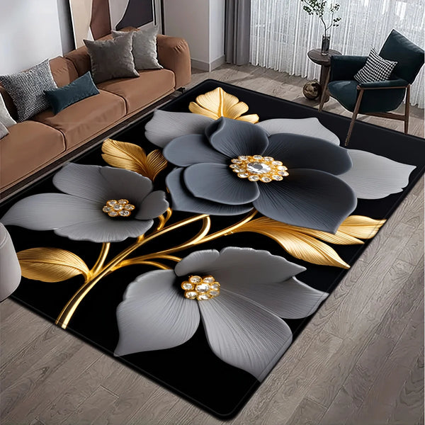 A black floor mat featuring a floral pattern with gray and gold leaves on a wooden floor.