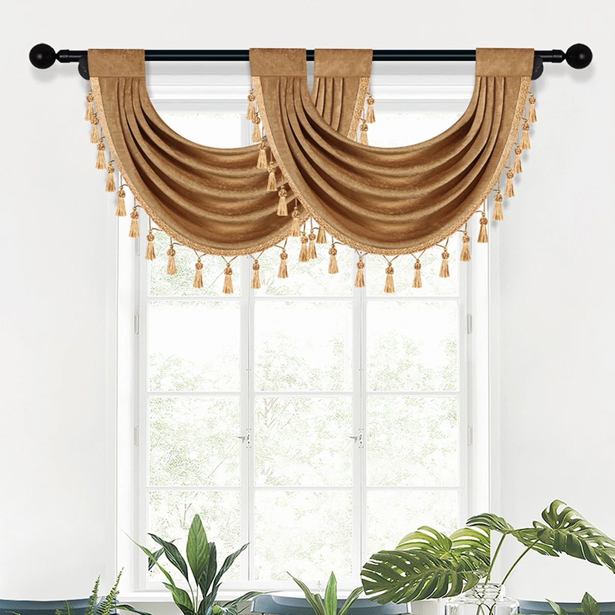 A pair of brown European style window curtains with tassels hanging from a black rod.