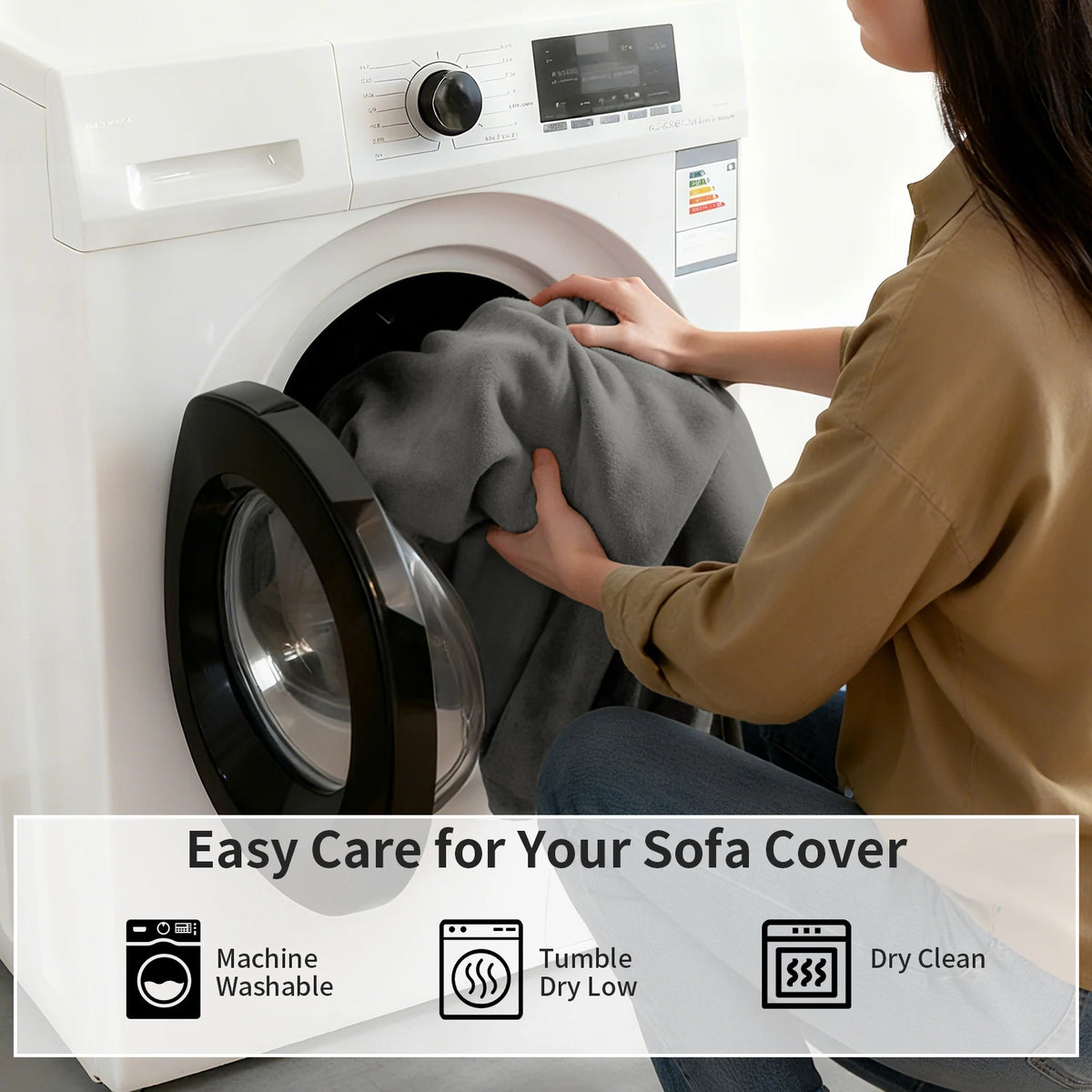 A person is placing a gray sofa cover into a white washing machine for easy care.