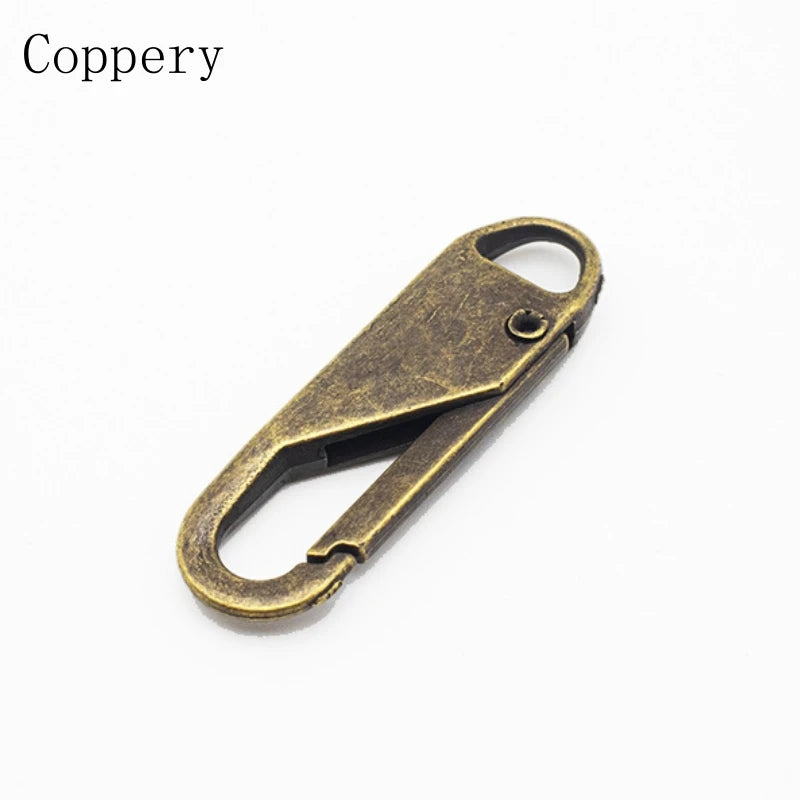 A brass copper zipper pull replacement set used for bags and garments.