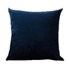 A dark navy blue velvet throw pillow cover resting on a white background.