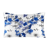A white pillowcase featuring a blue and gray floral print with detailed flowers and foliage.