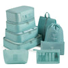 A set of six teal travel storage organizers and one cosmetic pouch for travel organization