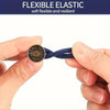 A hand is stretching a blue elastic extender on a button, demonstrating its flexible and resilient nature.