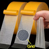 A hand holds a roll of no-sew hem tape, showing the grid pattern and adhesive fabric tape for quick folds and repairs.