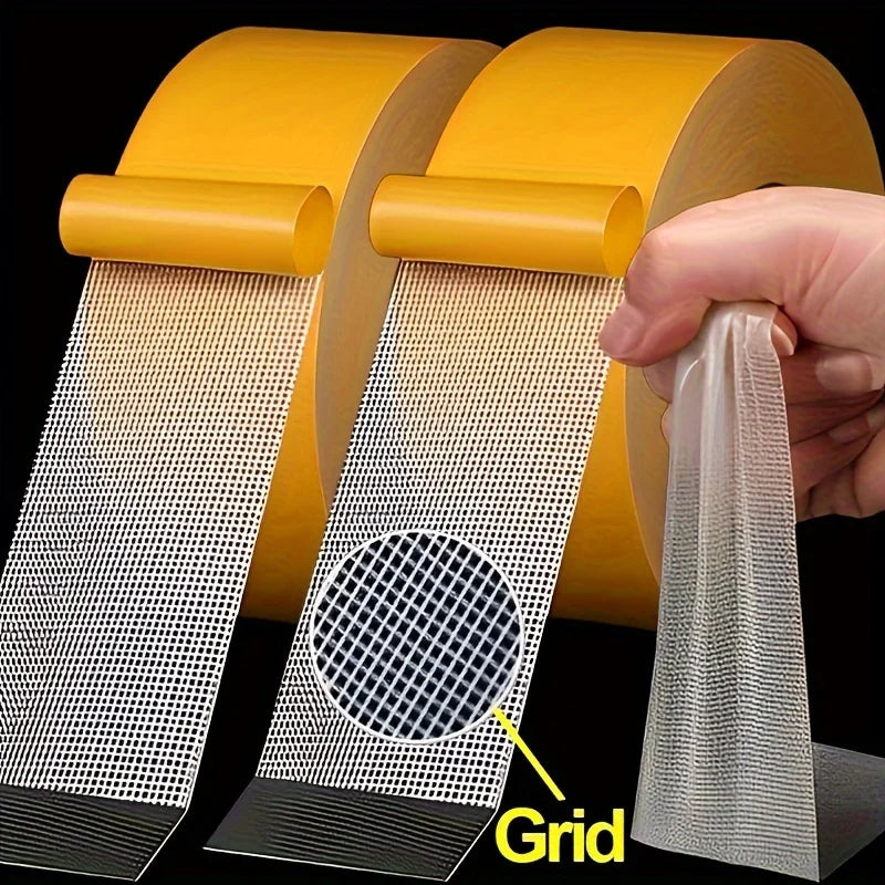 A hand holds a roll of no-sew hem tape, showing the grid pattern and adhesive fabric tape for quick folds and repairs.