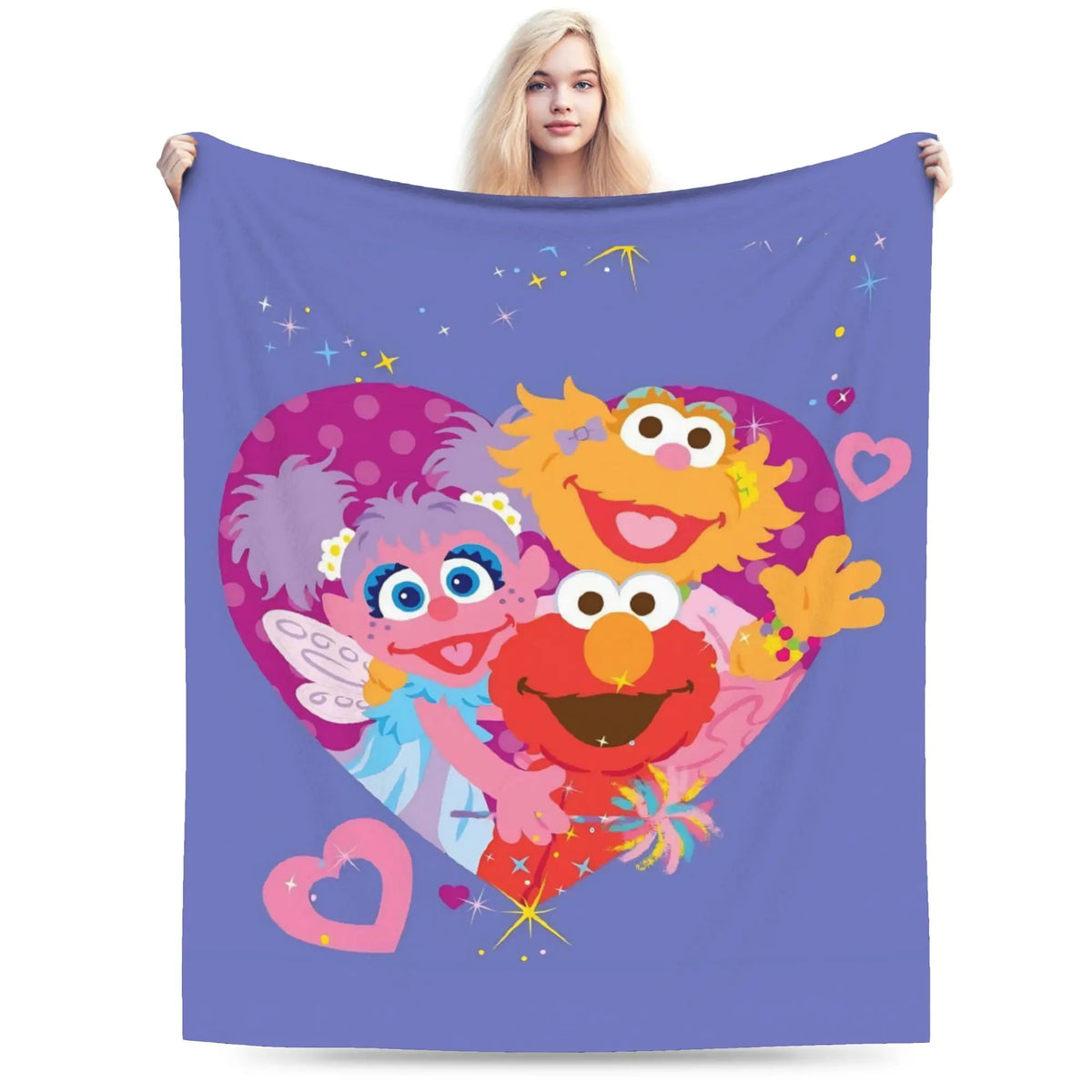 A purple flannel throw blanket featuring a cartoon design of Elmo and Friends