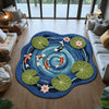 A round rug featuring a blue background with green and pink koi fish patterns on a wooden floor.