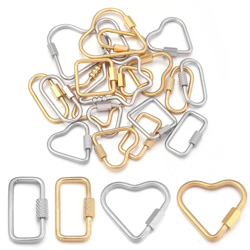 Assortment of gold and silver heart-shaped screw lock carabiner clasps for jewelry making