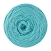 A ball of teal blue soft T-shirt yarn for crochet