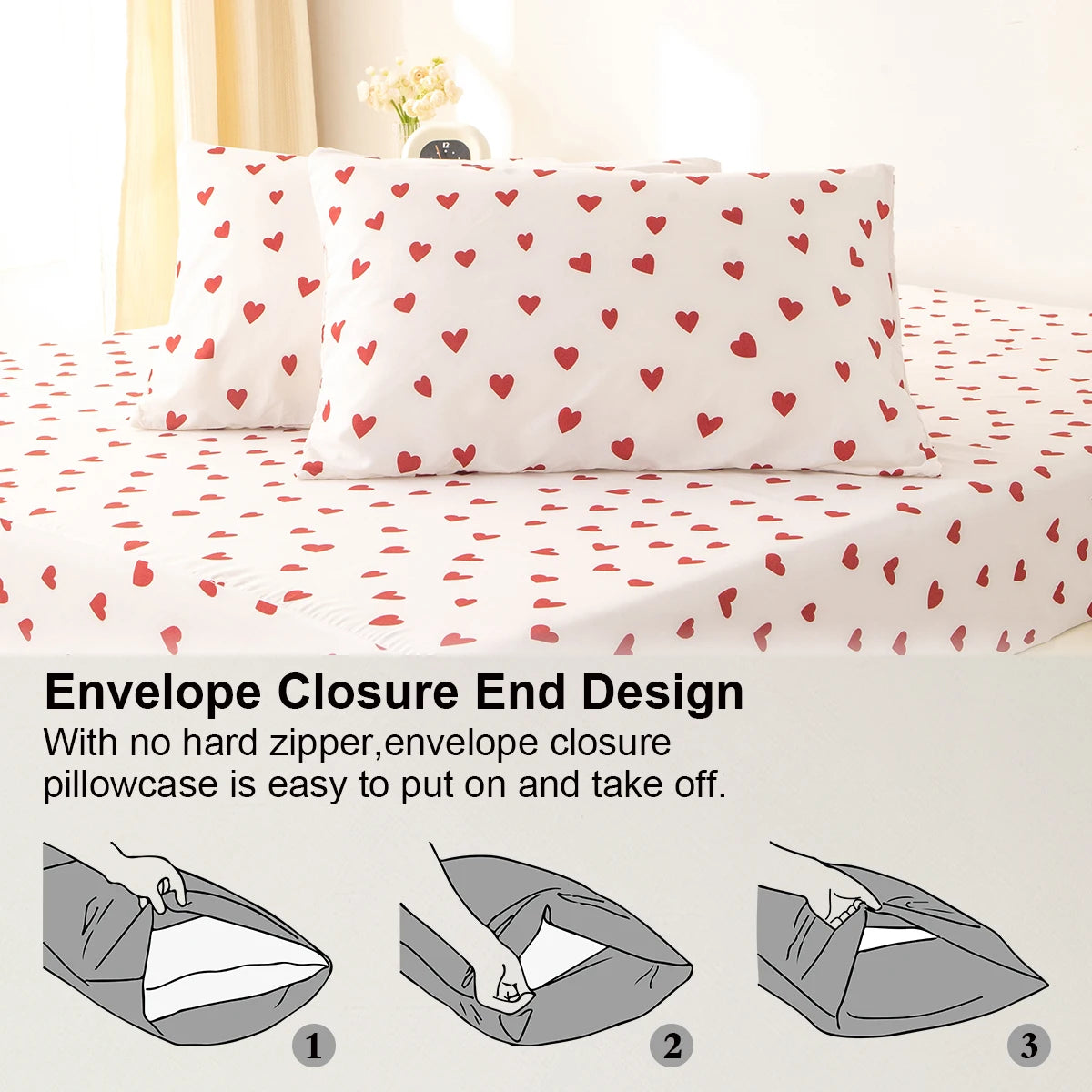 Three white pillowcases with a red heart print on a pink duvet cover.