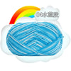 Blue premium milk cotton yarn skein with a rainbow background and cloud graphic