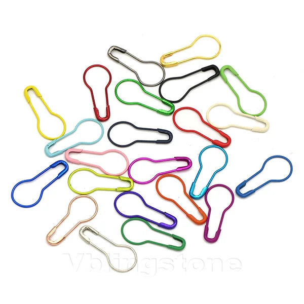 A collection of various gourd-shaped locking safety pins in different colors and shapes.