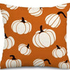 Orange pumpkin pattern pillow covers with white pumpkins