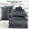 A set of 7 pieces including pillows, sheets, and a comforter in gray fabric for bedding.