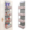 A tall, silver over-the-door storage organizer with multiple compartments for small items like toys and craft supplies.