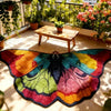 A colorful, irregular shaped plush floor rug featuring vibrant shades of orange, yellow, green, blue, and pink.