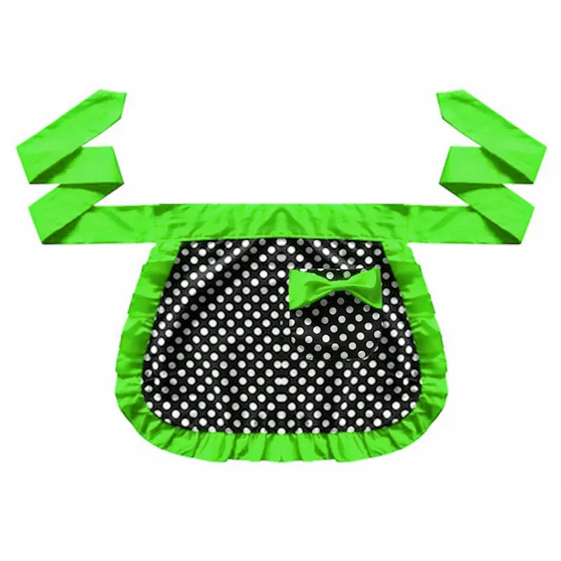 A bright lime green ruffle apron with pockets featuring a black polka dot pattern and a green bow.