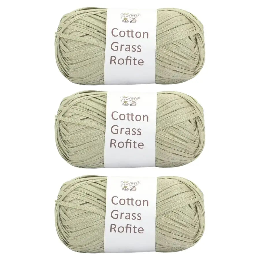 Three skeins of natural cotton grass roving yarn labeled as Rofite