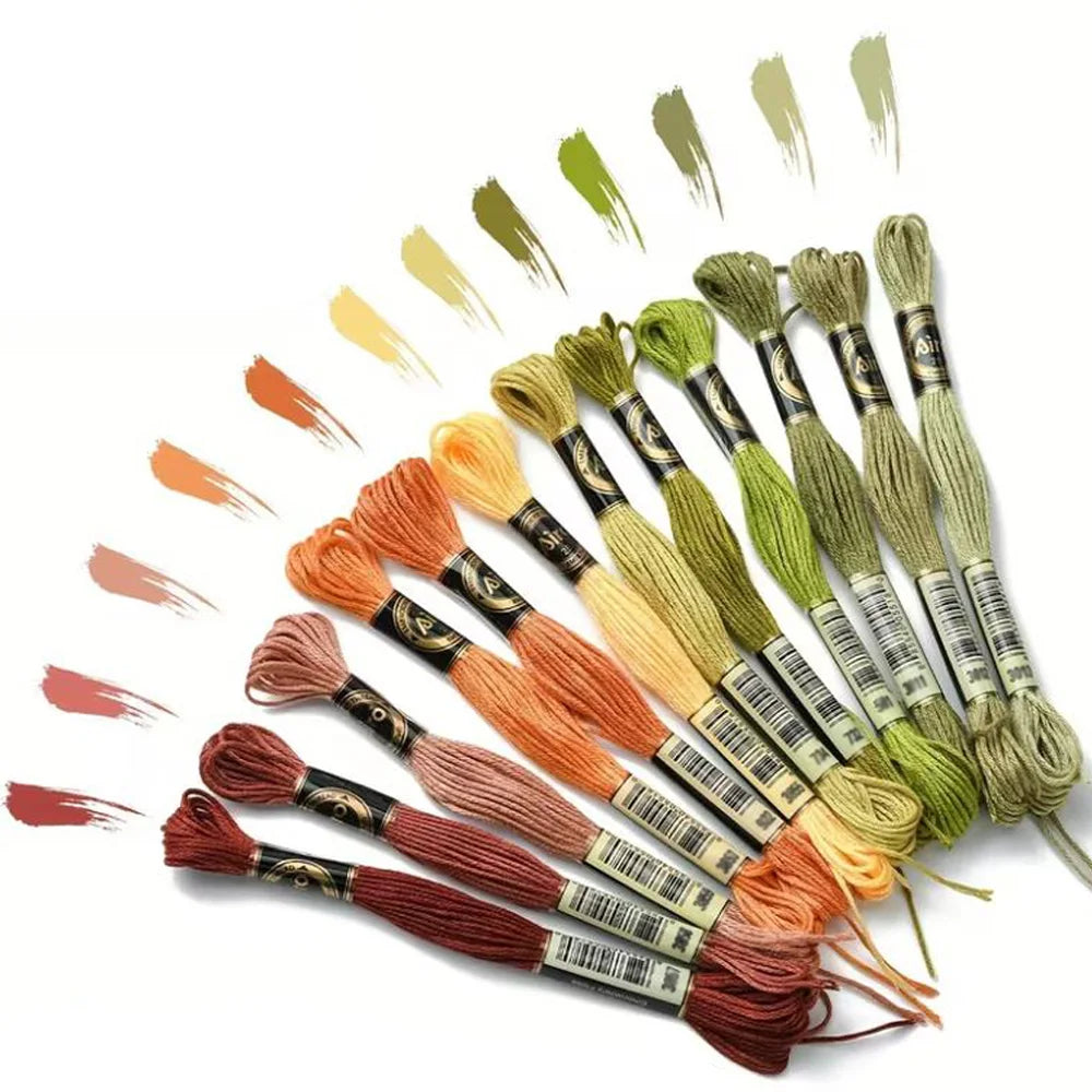 A collection of 12 pack rainbow gradient embroidery floss threads in various shades and colors.
