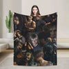 A collage of various male characters from a series printed on a cozy graphic throw blanket.