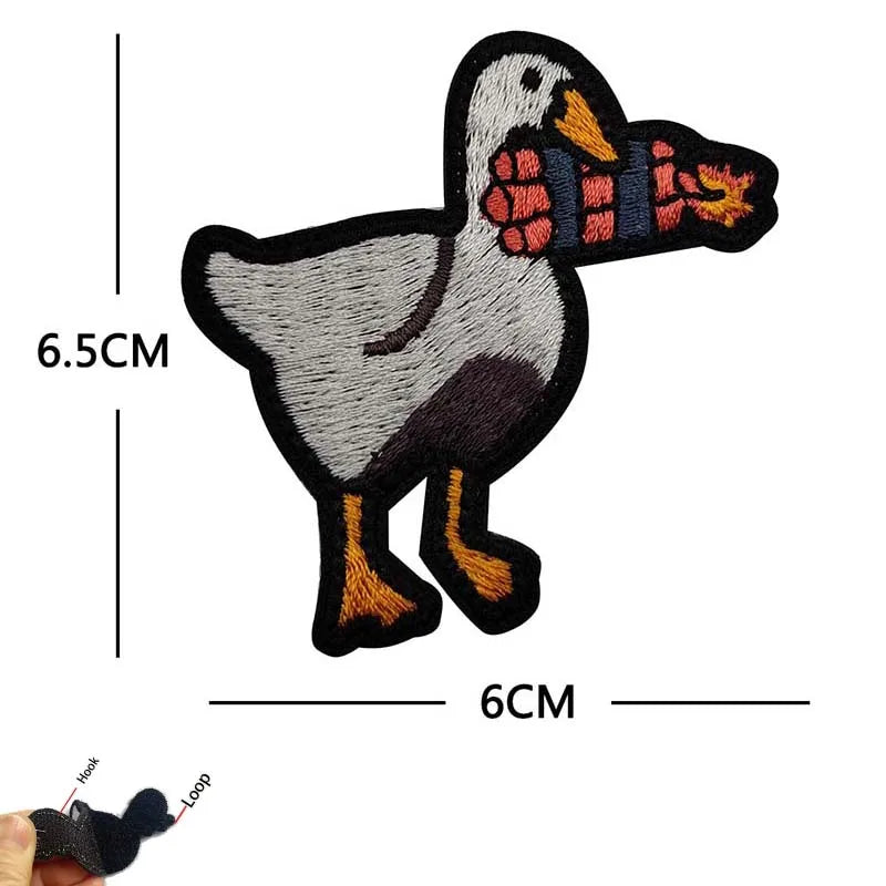 Embroidered tactical patch of a duck with an angry expression