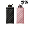 A pair of pink and black quilted PU leather eyeglass cases with cleaning cloths.