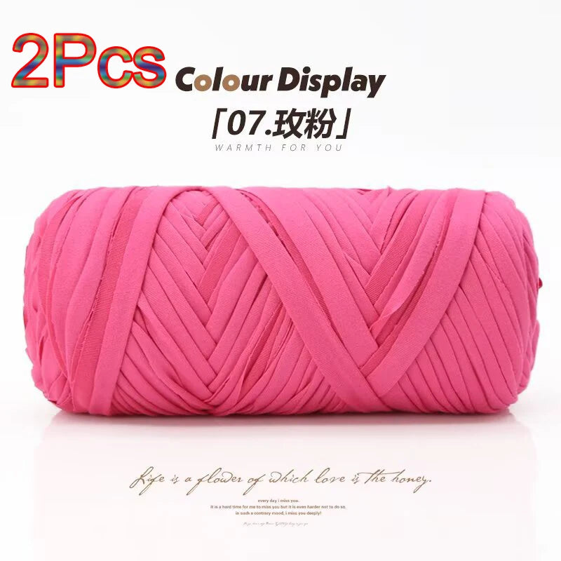 Two pink reusable elastic yarn strands displayed for crafting