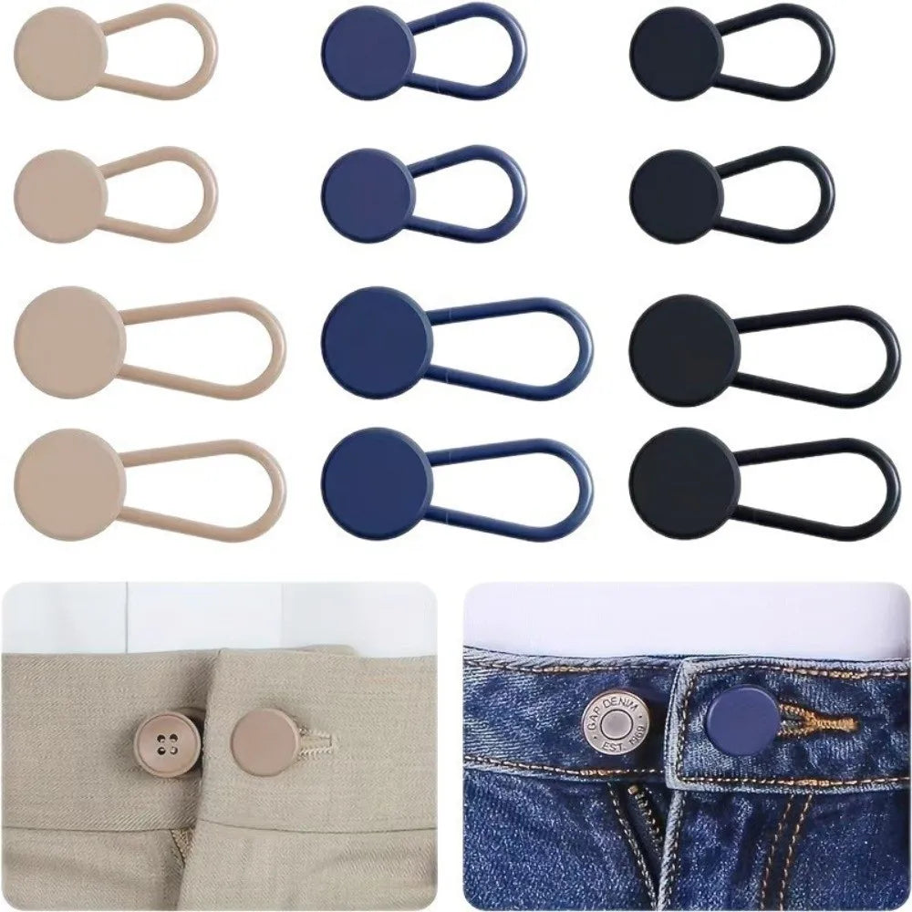 A set of metal waistbands with elastic extenders in various colors and finishes shown on denim fabric.