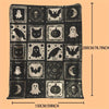 A dark flannel patchwork throw blanket featuring various spooky Halloween motifs like bats ghosts cats and pumpkins