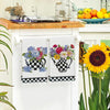 A set of two white kitchen towels featuring colorful floral designs on a black and white checkered pattern.