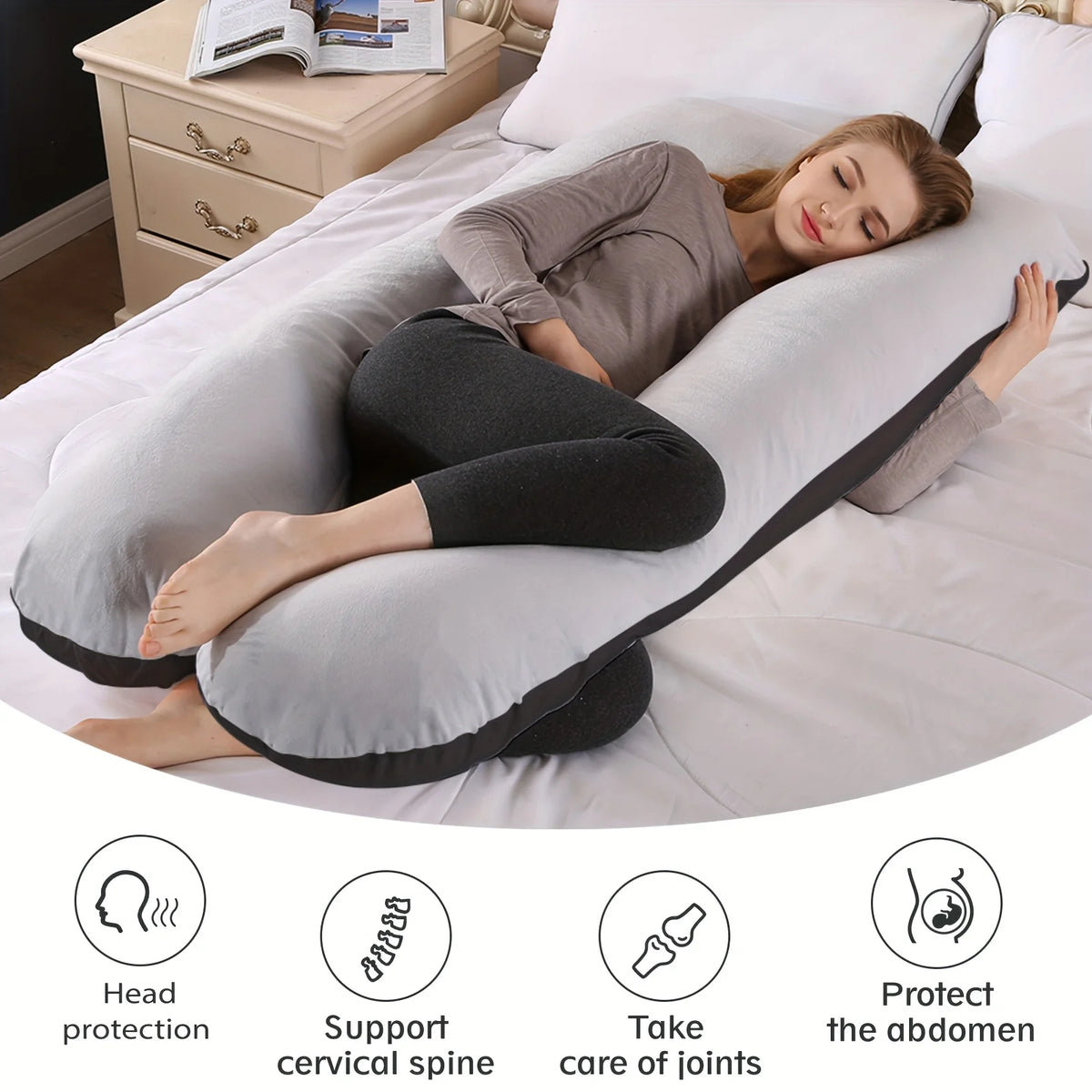 A woman lies comfortably on an ergonomic U-shape memory foam pillow for neck and body support.