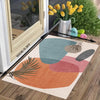 A floor mat featuring abstract shapes in teal, orange, and gray tones with decorative yellow tulips and colorful glass balls.